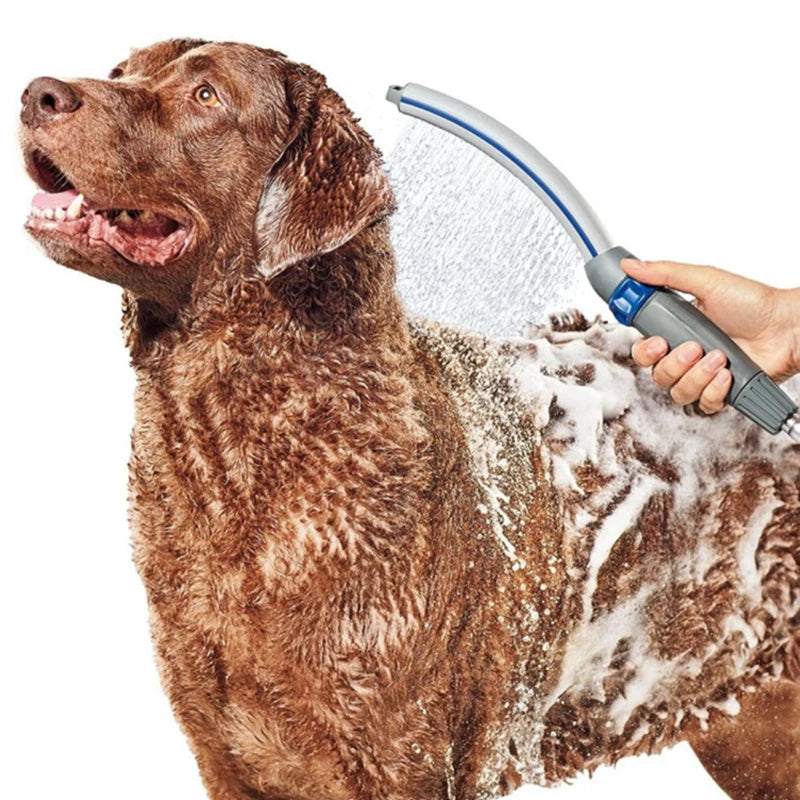 dog shower sprayer close up with dog